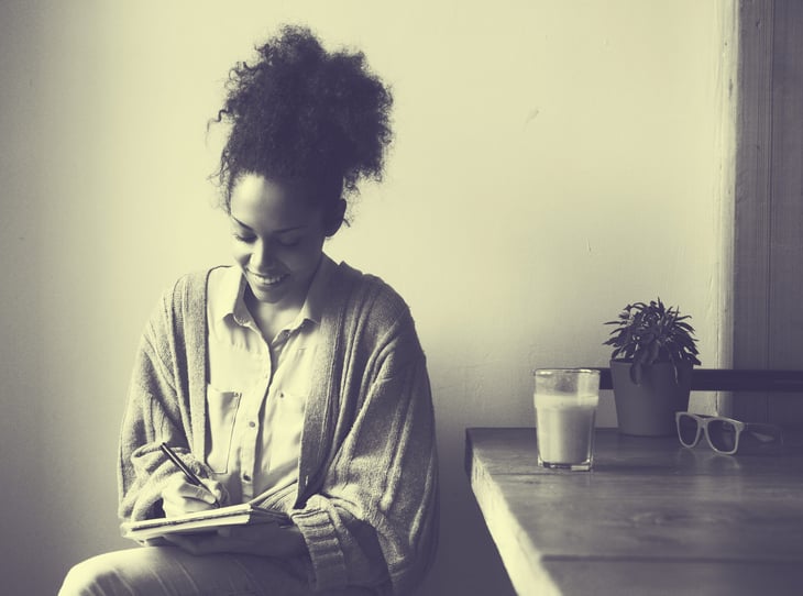 Writing in book