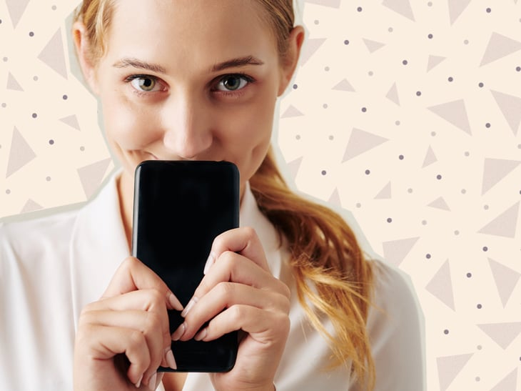 Person med mobiltelefon